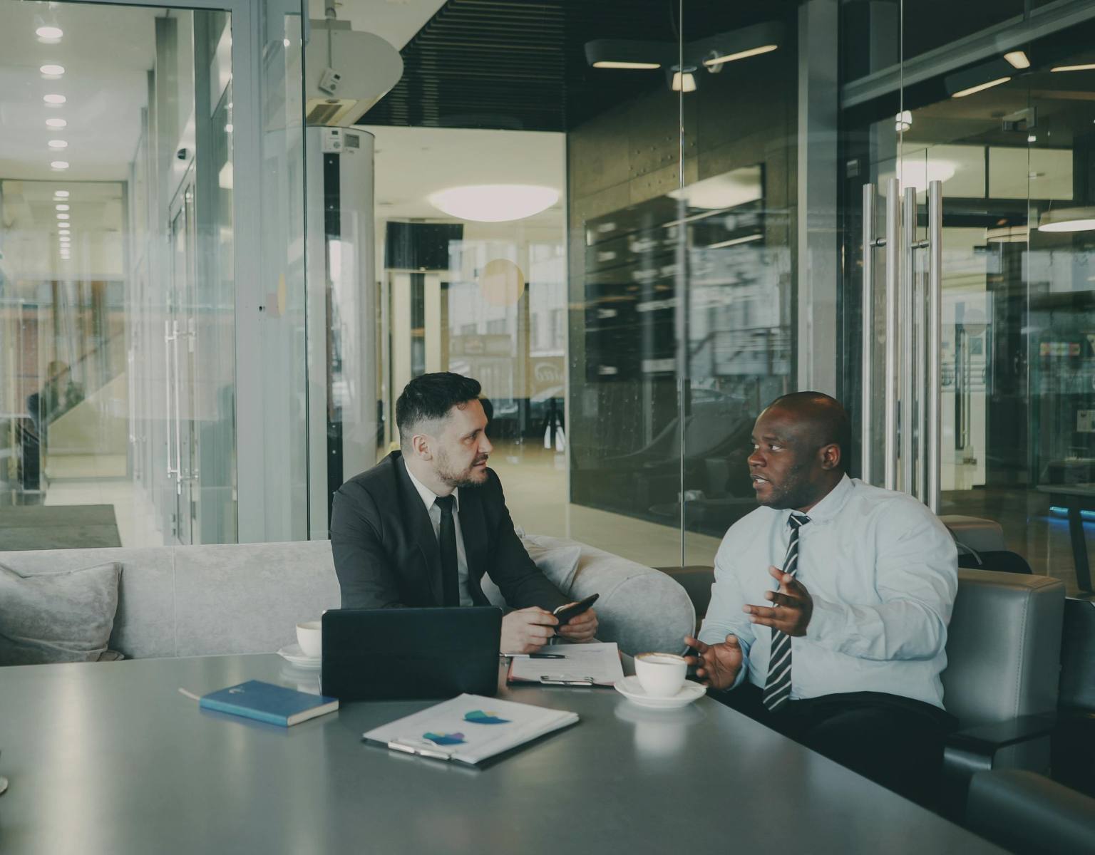 Two business people having a meeting in a modern office